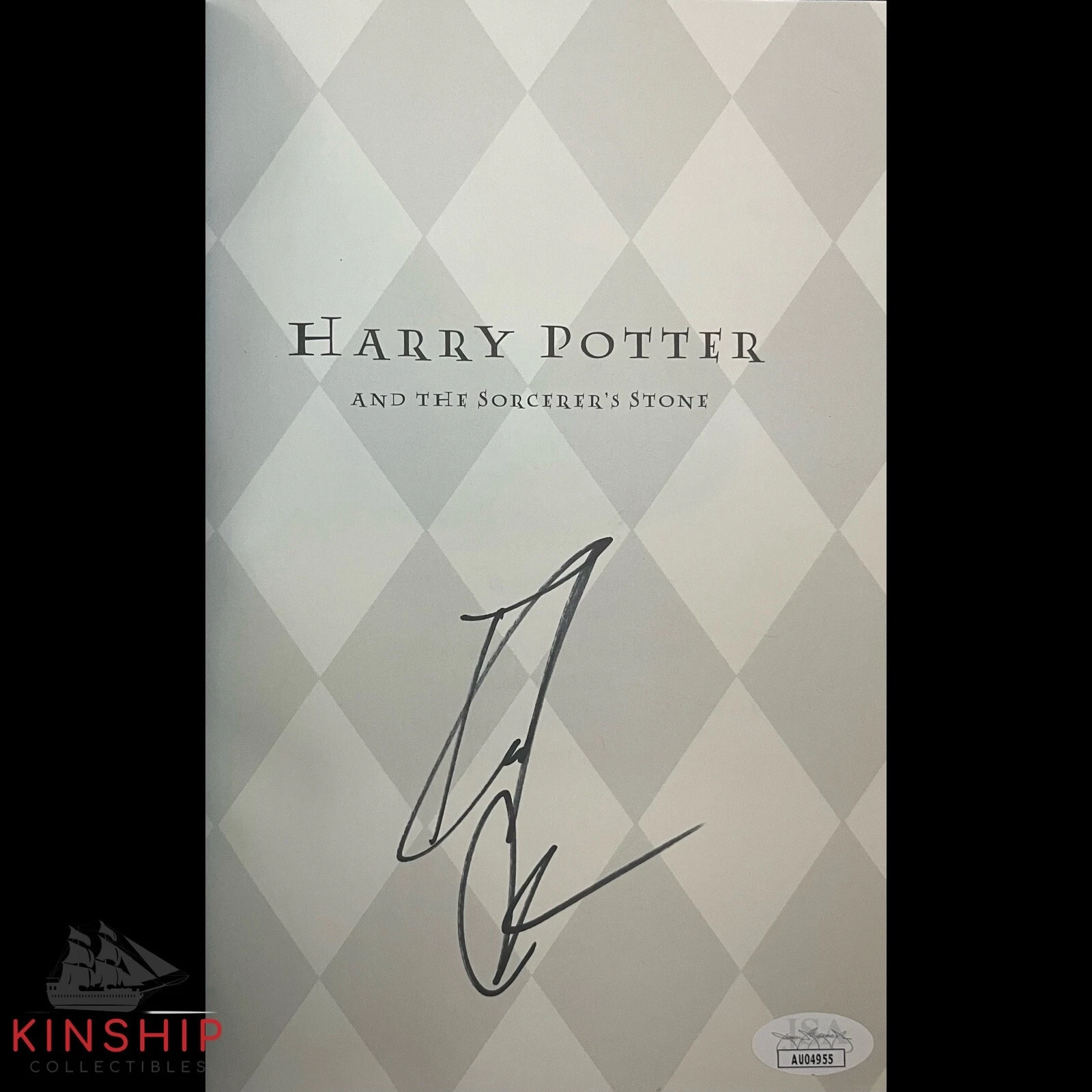 Daniel Radcliffe signed Harry Potter And The Sorcerer's Stone Book JSA COA E223