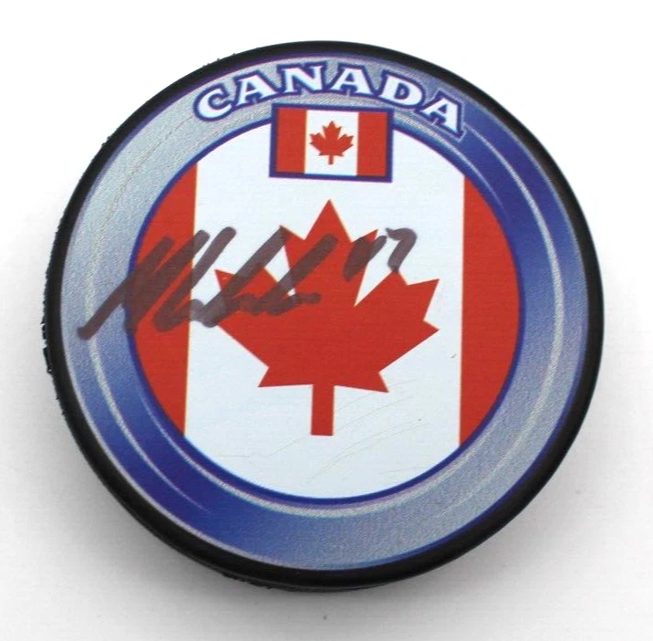 Macklin Celebrini Signed Team Canada Sharks Hockey Puck w/Beckett COA BJ070472