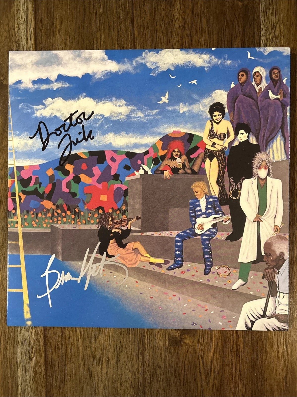 ‘PRINCE AND THE REVOLUTION’ BAND DR. FINK SIGNED ‘AROUND THE WORLD’ VINYL ALBUM COLLECTIBLE MEMORABILIA