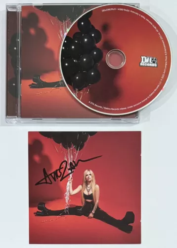 AVRIL LAVIGNE LOVE SUX SIGNED CD! AUTOGRAPHED on sale BOOKLET