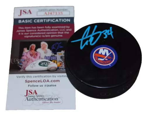 COLE EISERMAN SIGNED (NEW YORK ISLANDERS) LOGO HOCKEY PUCK JSA COA AJ47135 COLLECTIBLE MEMORABILIA