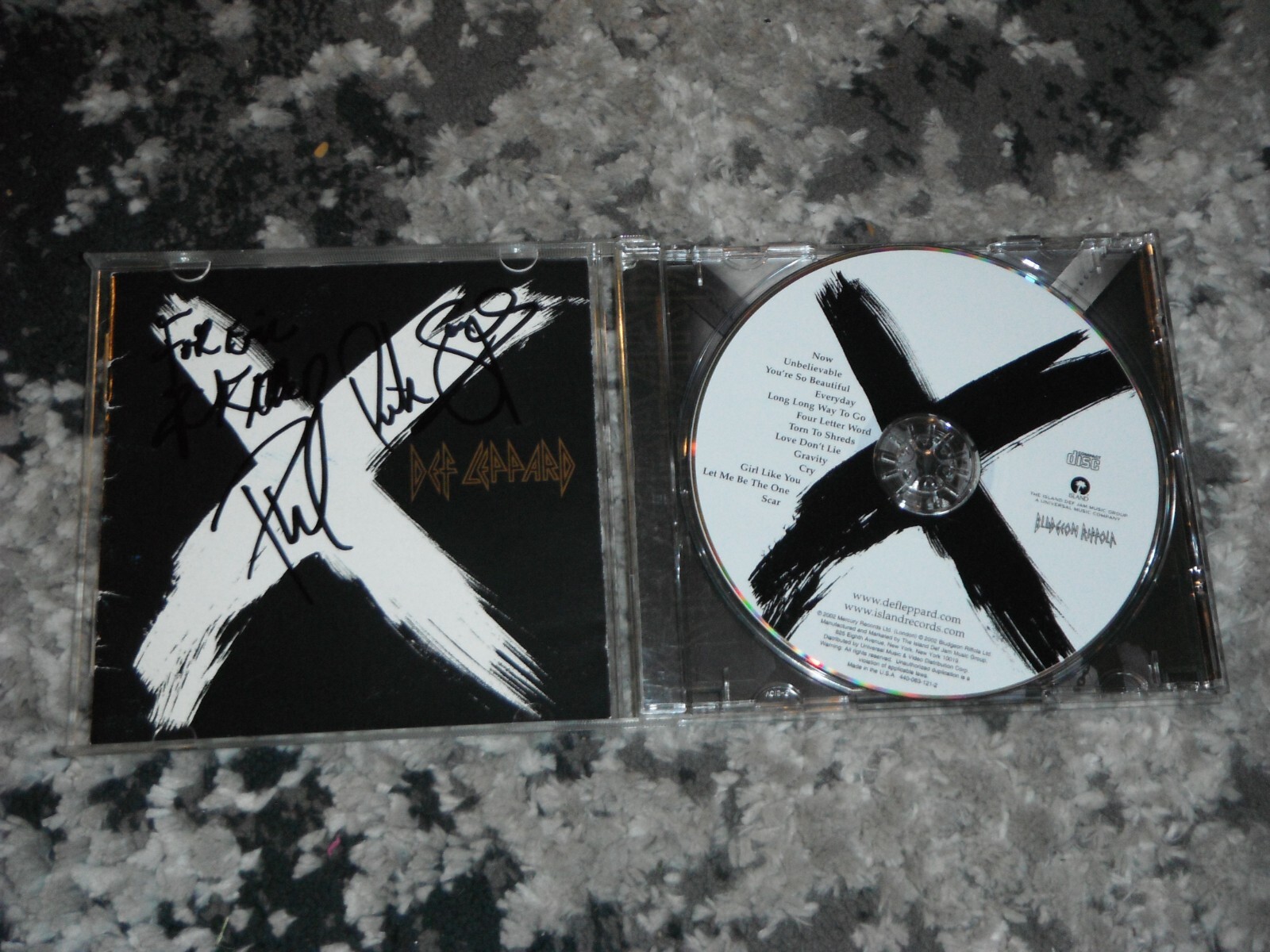 DEF LEPPARD GROUP SIGNED X CD COVER