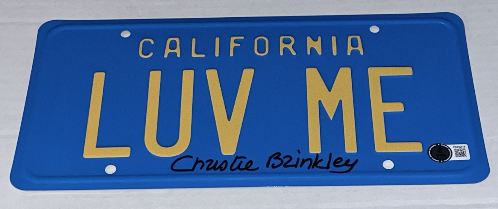 Christie Brinkley signed Lampoon's Vacation LUV ME License Plate Beckett Witness