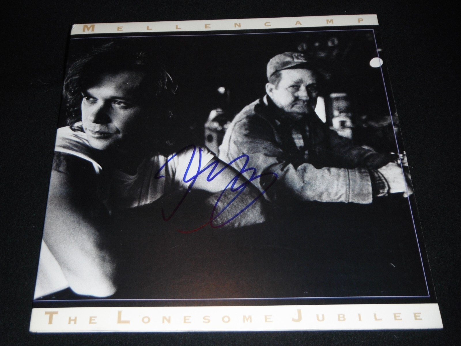 JOHN COUGAR MELLENCAMP SIGNED THE LONESOME JUBILEE ALBUM
