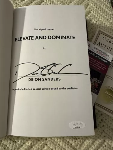 DEION SANDERS SIGNED ELEVATE DOMINATE BOOK HARDCOVER JSA AUTHENTICATED COA 2024 COLLECTIBLE MEMORABILIA