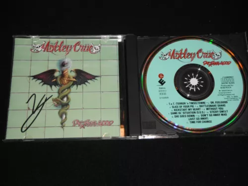 MOTLEY CRUE SIGNED VINCE NEIL DR. FEEL GOOD CD COVER COLLECTIBLE MEMORABILIA