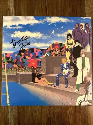 ‘PRINCE AND THE REVOLUTION’ BAND DR. FINK SIGNED ‘AROUND THE WORLD’ VINYL ALBUM COLLECTIBLE MEMORABILIA