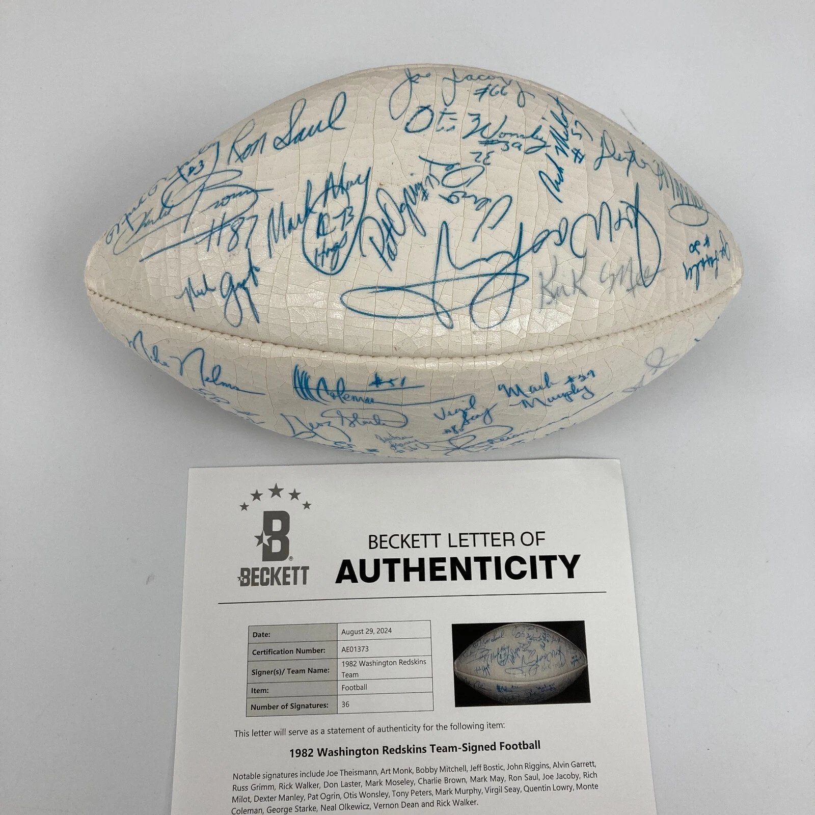 1982 WASHINGTON REDSKINS SUPER BOWL CHAMPS TEAM SIGNED FOOTBALL BECKETT COA COLLECTIBLE MEMORABILIA