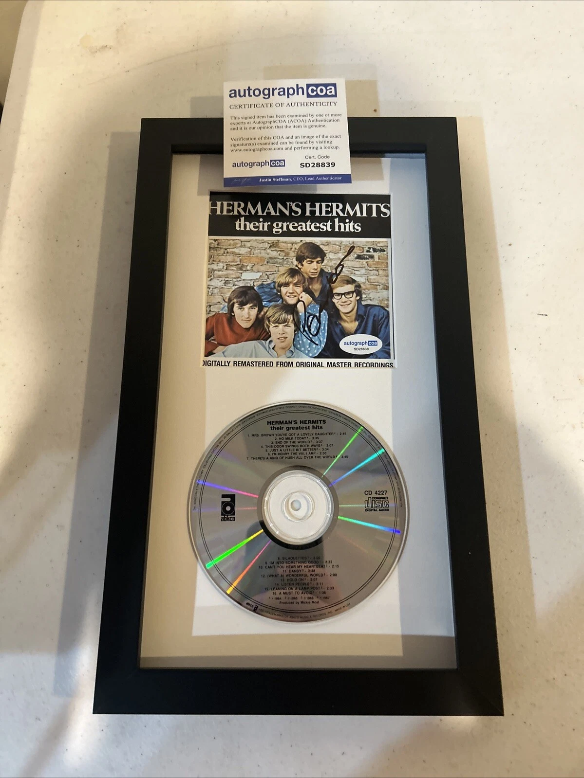PETER NOONE SIGNED AUTOGRAPH FRAMED CD DISPLAY ACOA HERMANS HERMITS ALBUM