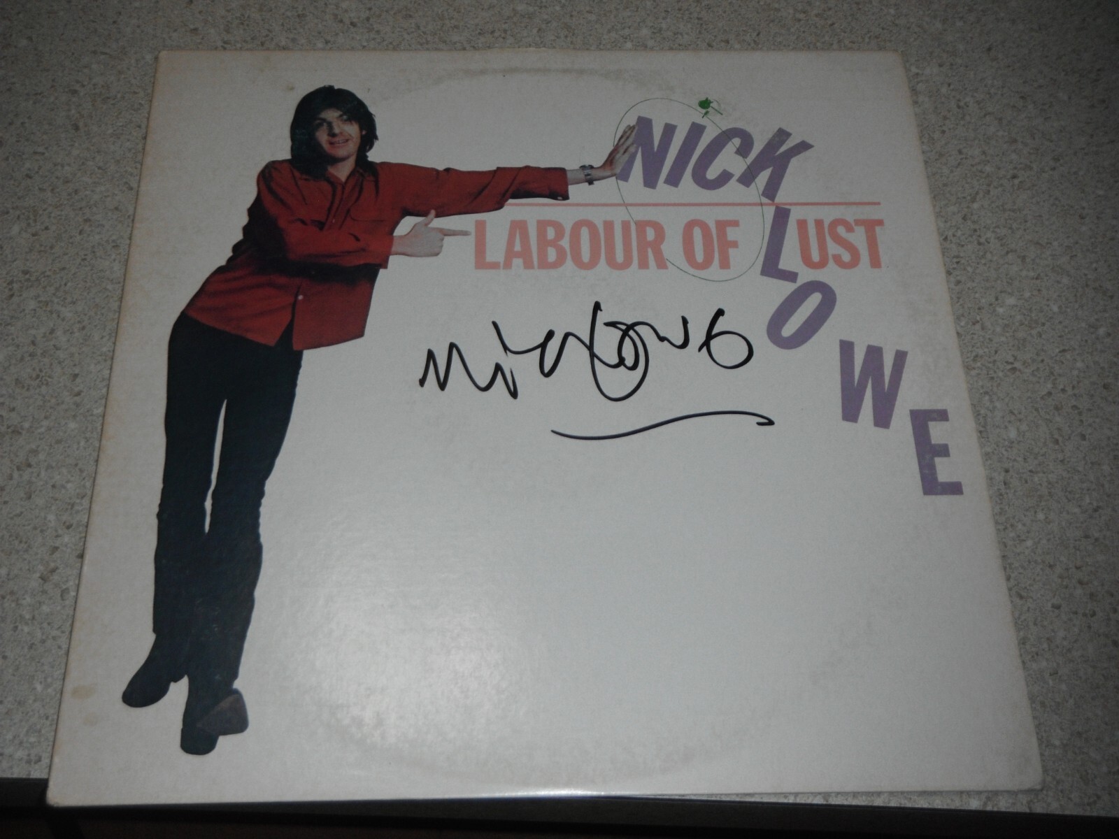 NICK LOWE SIGNED LABOUR OF LUST VINYL ALBUM