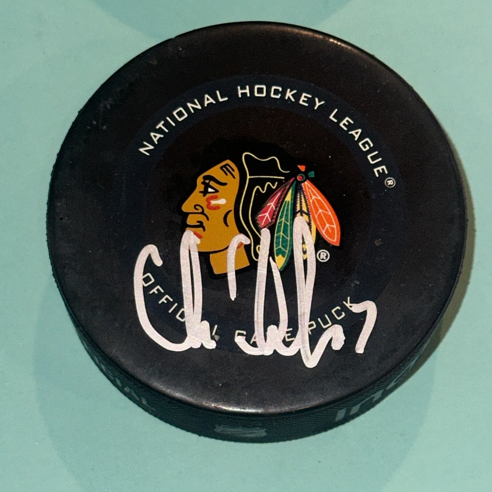 CHRIS CHELIOS Signed BLACKHAWKS Official GAME Puck Beckett Auth BAS & HOF Insc
