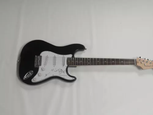 NICK LOWE SIGNED BLACK ELECTRIC GUITAR ELVIS COSTELLO LEGEND AUTOGRAPHED COLLECTIBLE MEMORABILIA