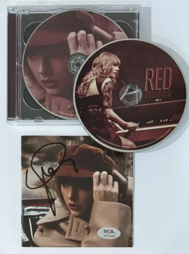 TAYLOR SWIFT RED TAYLORS VERSION TV CD SIGNED AUTOGRAPHED COVER BOOK PSA DNA COA COLLECTIBLE MEMORABILIA