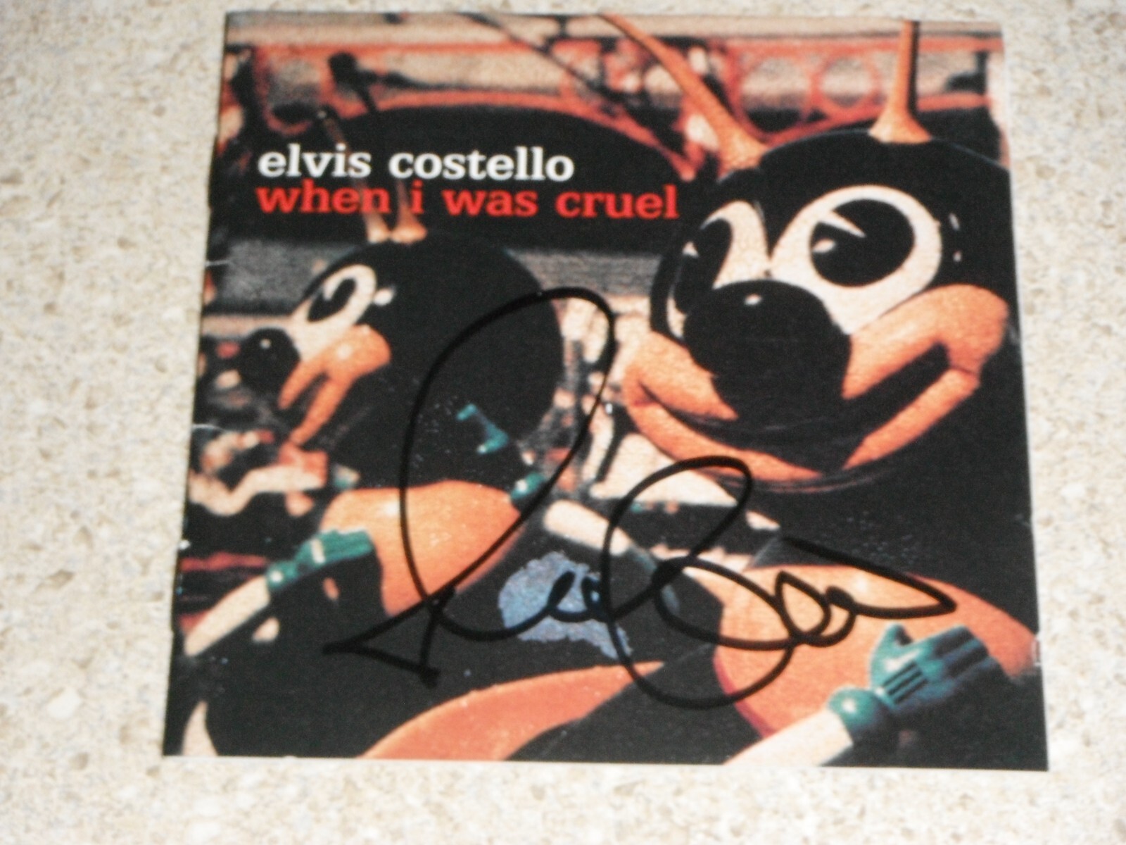ELVIS COSTELLO SIGNED WHEN I WAS CRUEL CD COVER