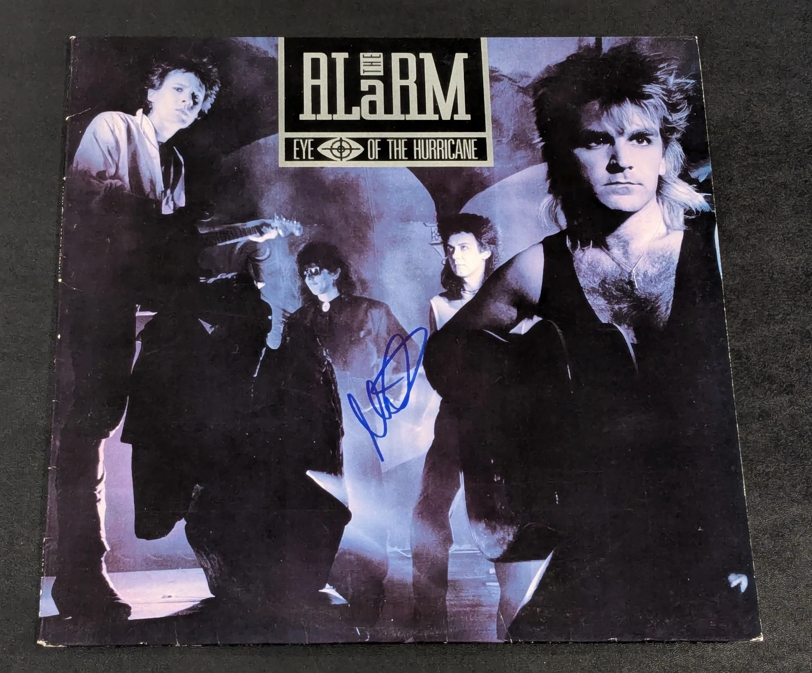 THE ALARM MIKE PETERS signed autographed EYE OF THE STORM LP RECORD BECKETT BAS