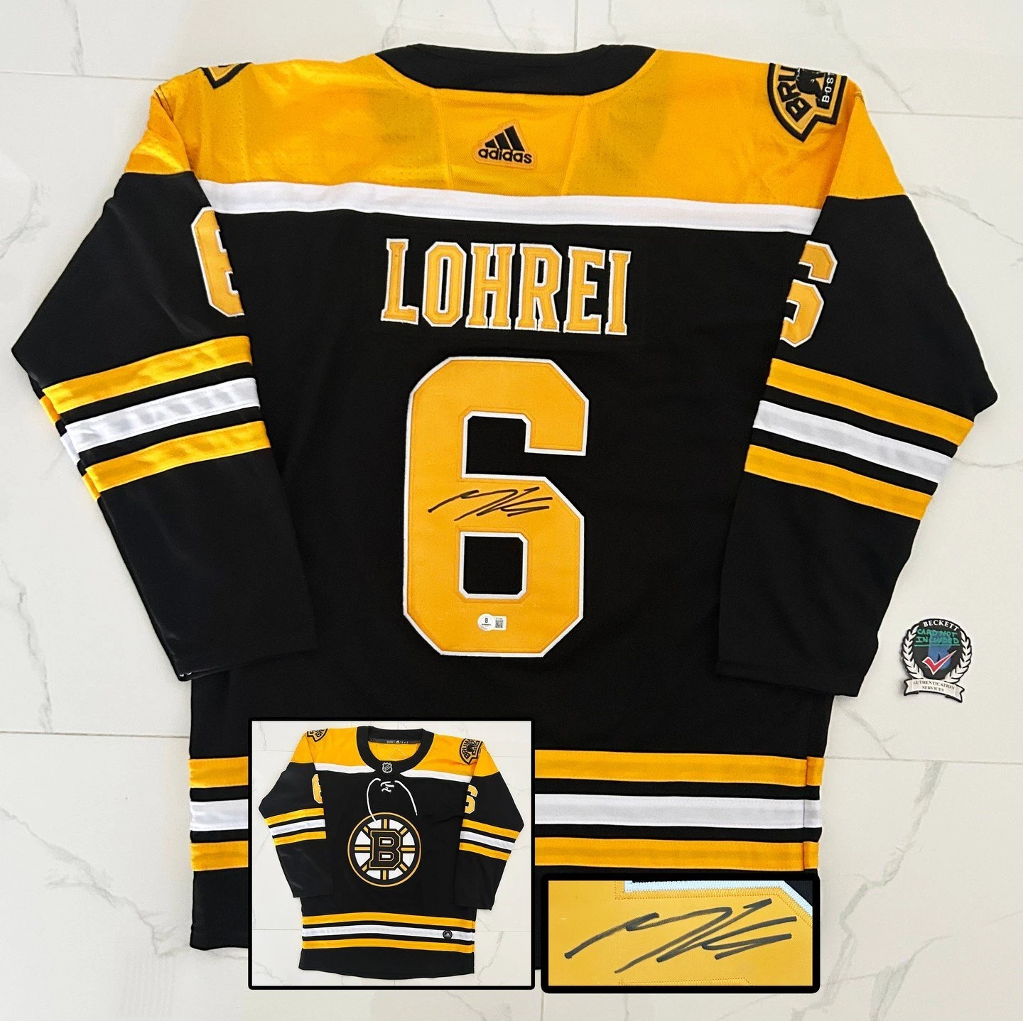 Mason Lohrei Signed Jersey Boston Bruins Beckett BAS COA