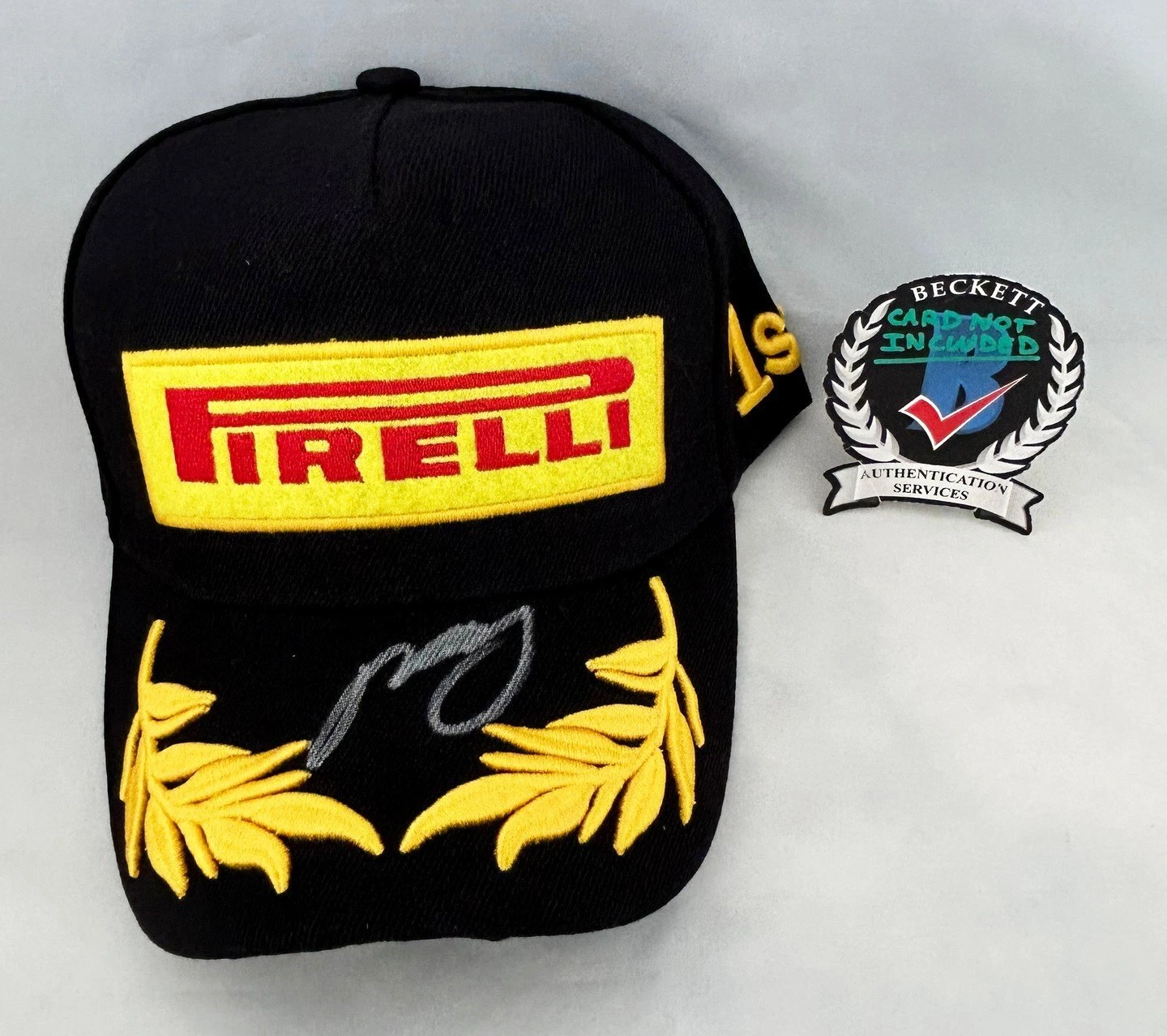 ZHOU GUANYU SIGNED HAT PIRELLI STAKE ALFA ROMEO FORMULA 1 BECKETT BAS COA COLLECTIBLE MEMORABILIA