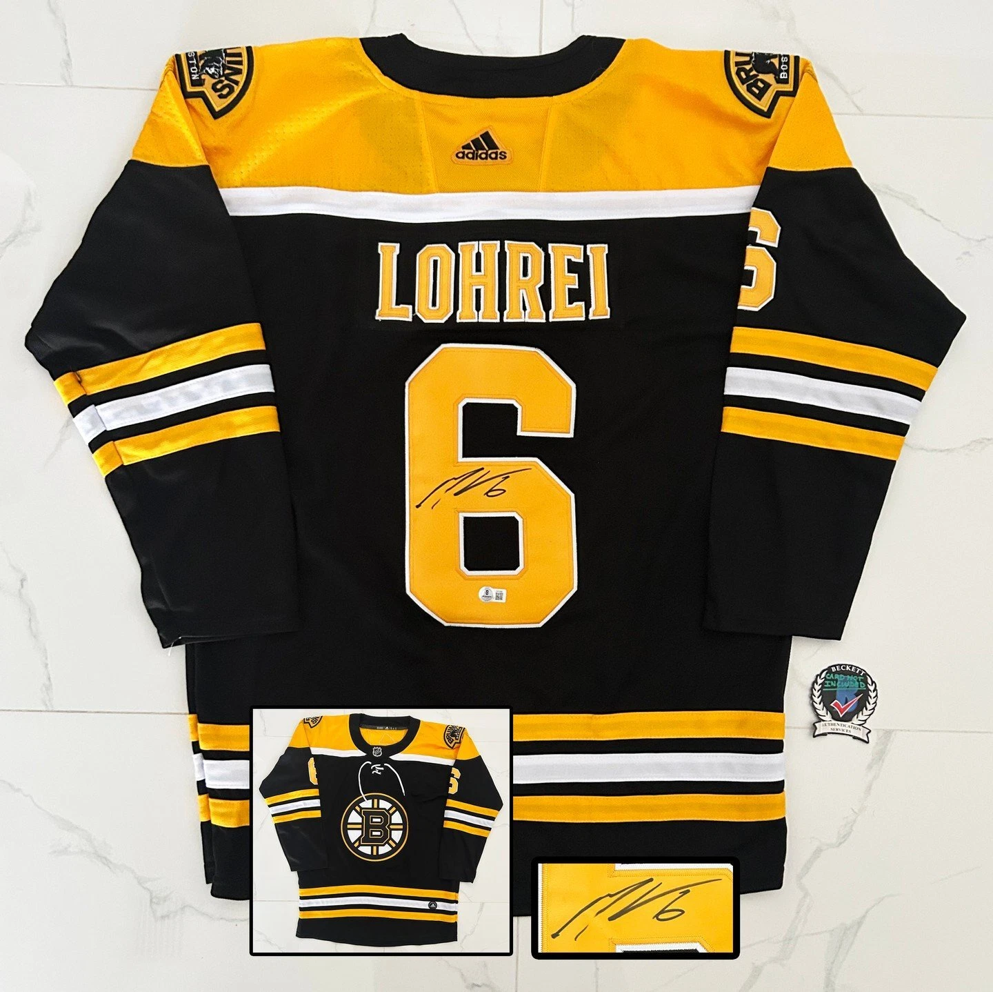 Mason Lohrei Signed Jersey Boston Bruins Beckett BAS 1 COA