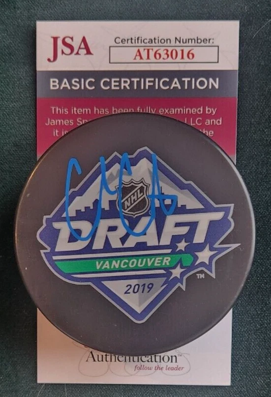 Cole Caufield Signed 2019 NHL Draft Puck w/ JSA COA #AT63016 Montreal Canadiens