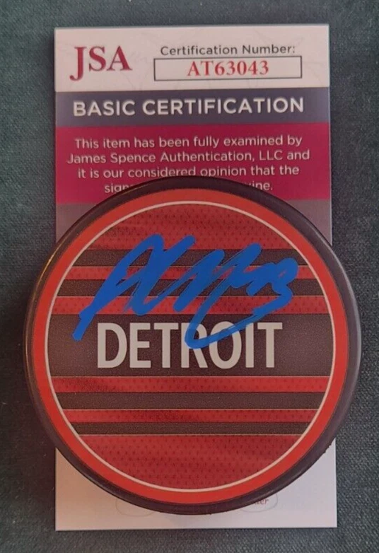 Alex DeBrincat Signed Reverse Retro Puck w/ JSA COA #AT63043 Detroit Red Wings