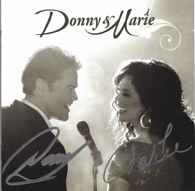 Donny & Marie Osmond REAL hand SIGNED Self-Titled CD Cover #2 COA Autographed