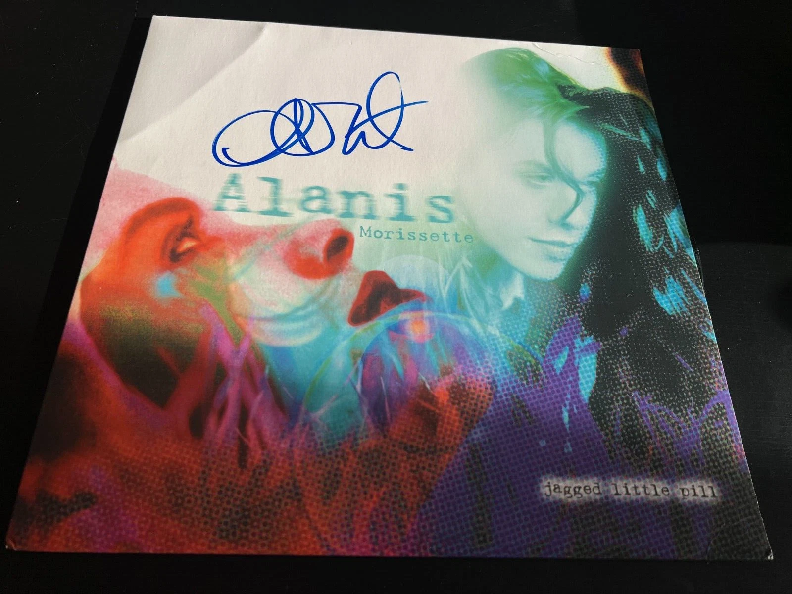 ALANIS MORISSETTE SIGNED AUTOGRAPH VINYL JAGGED LITTLE PILL IRONIC BECKETT BAS E