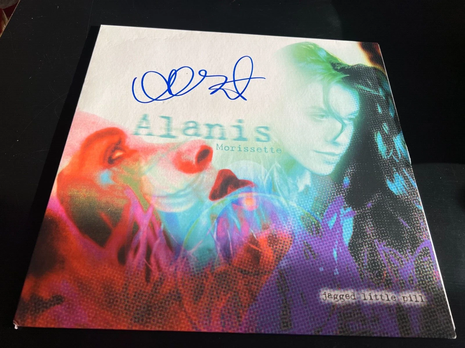 ALANIS MORISSETTE SIGNED AUTOGRAPH VINYL JAGGED LITTLE PILL IRONIC BECKETT BAS F