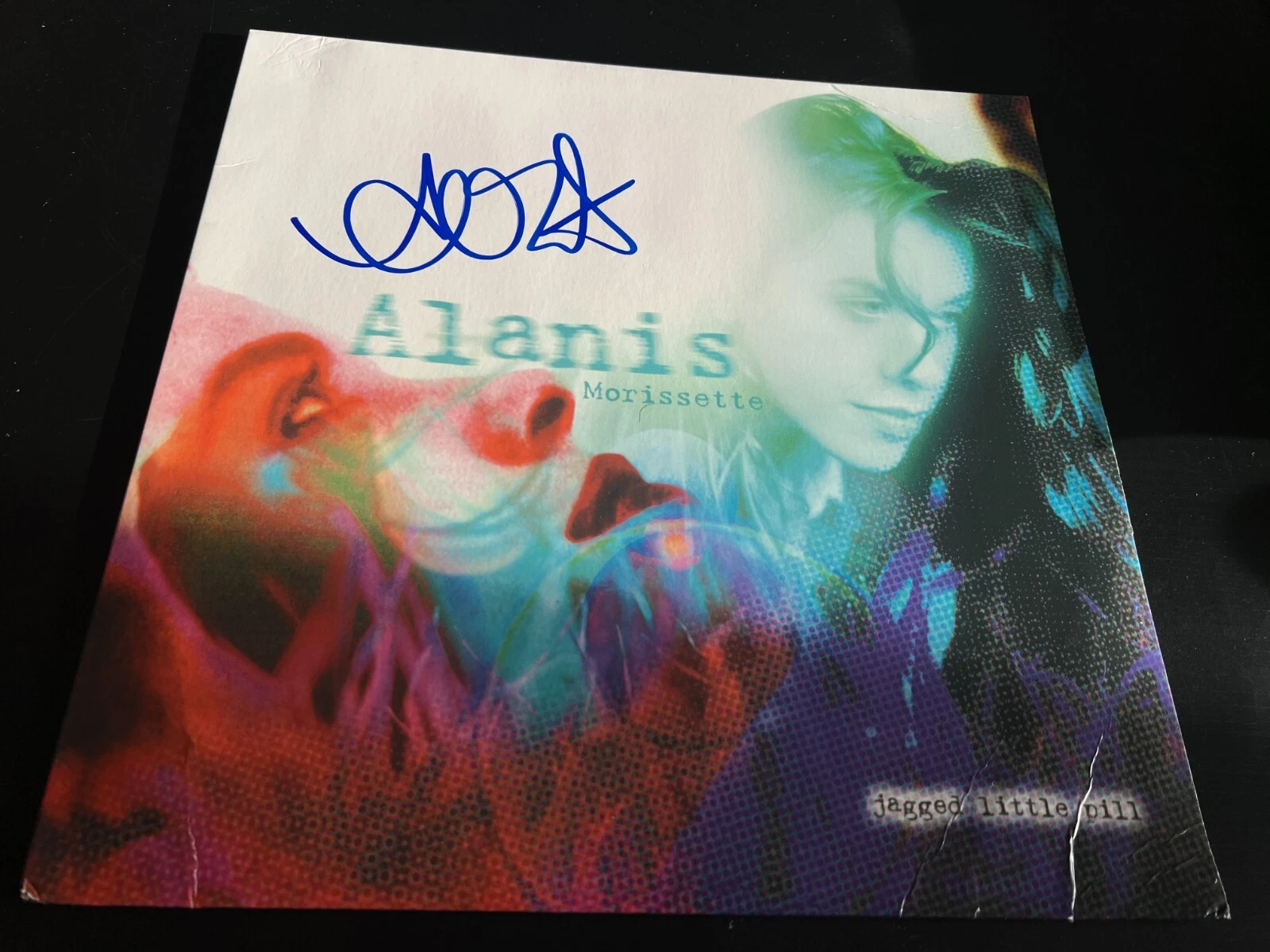 ALANIS MORISSETTE SIGNED AUTOGRAPH VINYL JAGGED LITTLE PILL IRONIC BECKETT BAS C