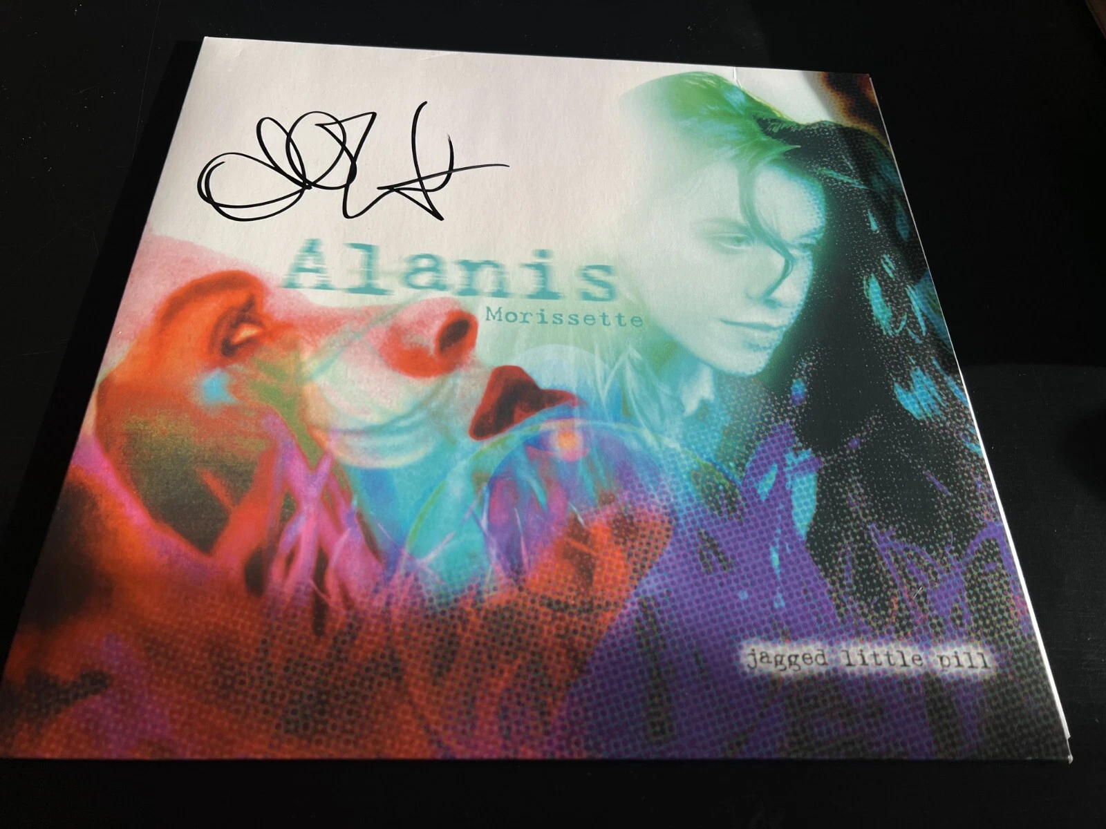 ALANIS MORISSETTE SIGNED AUTOGRAPH VINYL JAGGED LITTLE PILL IRONIC BECKETT BAS E