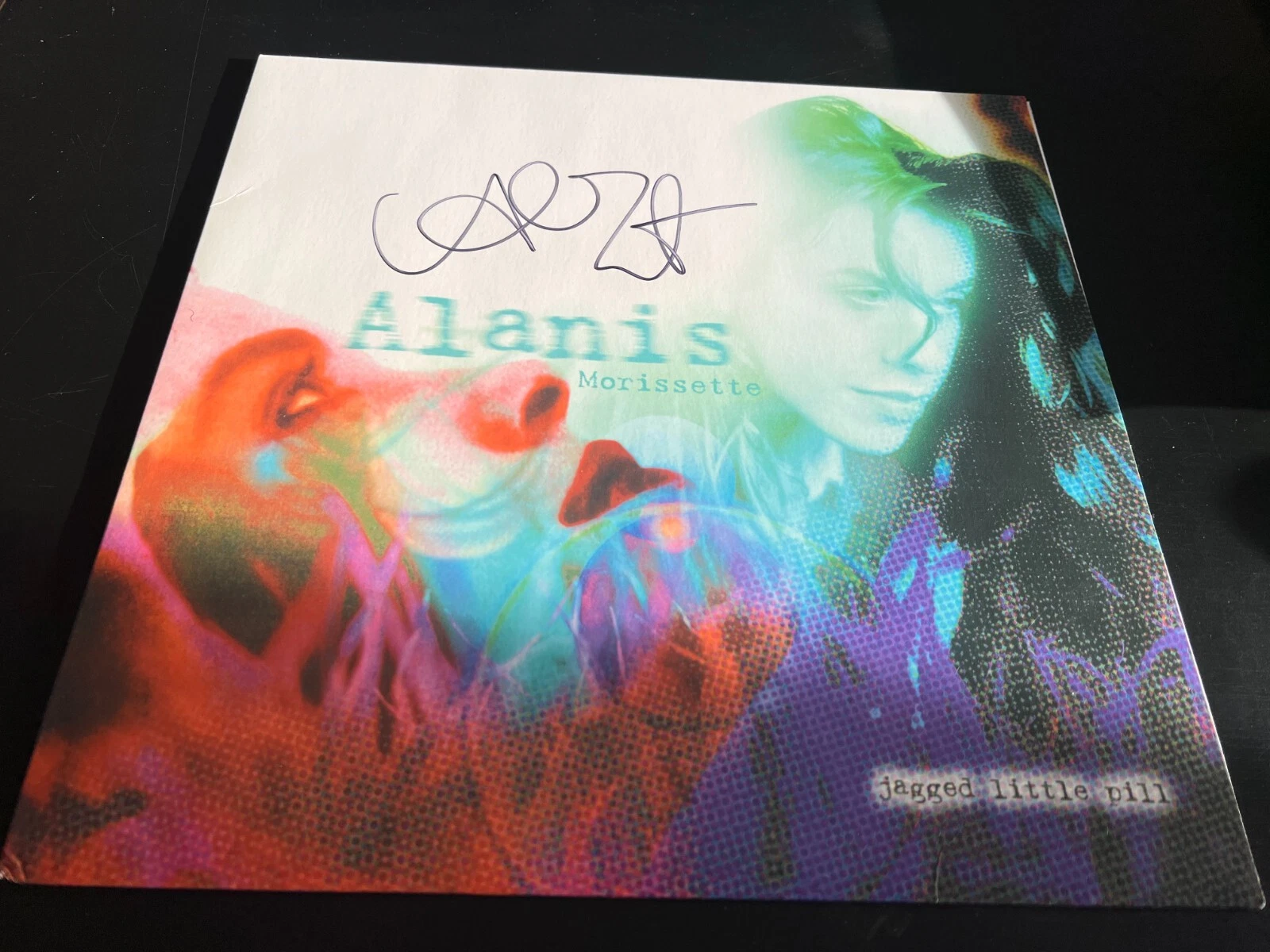 ALANIS MORISSETTE SIGNED AUTOGRAPH VINYL JAGGED LITTLE PILL IRONIC BECKETT BAS G