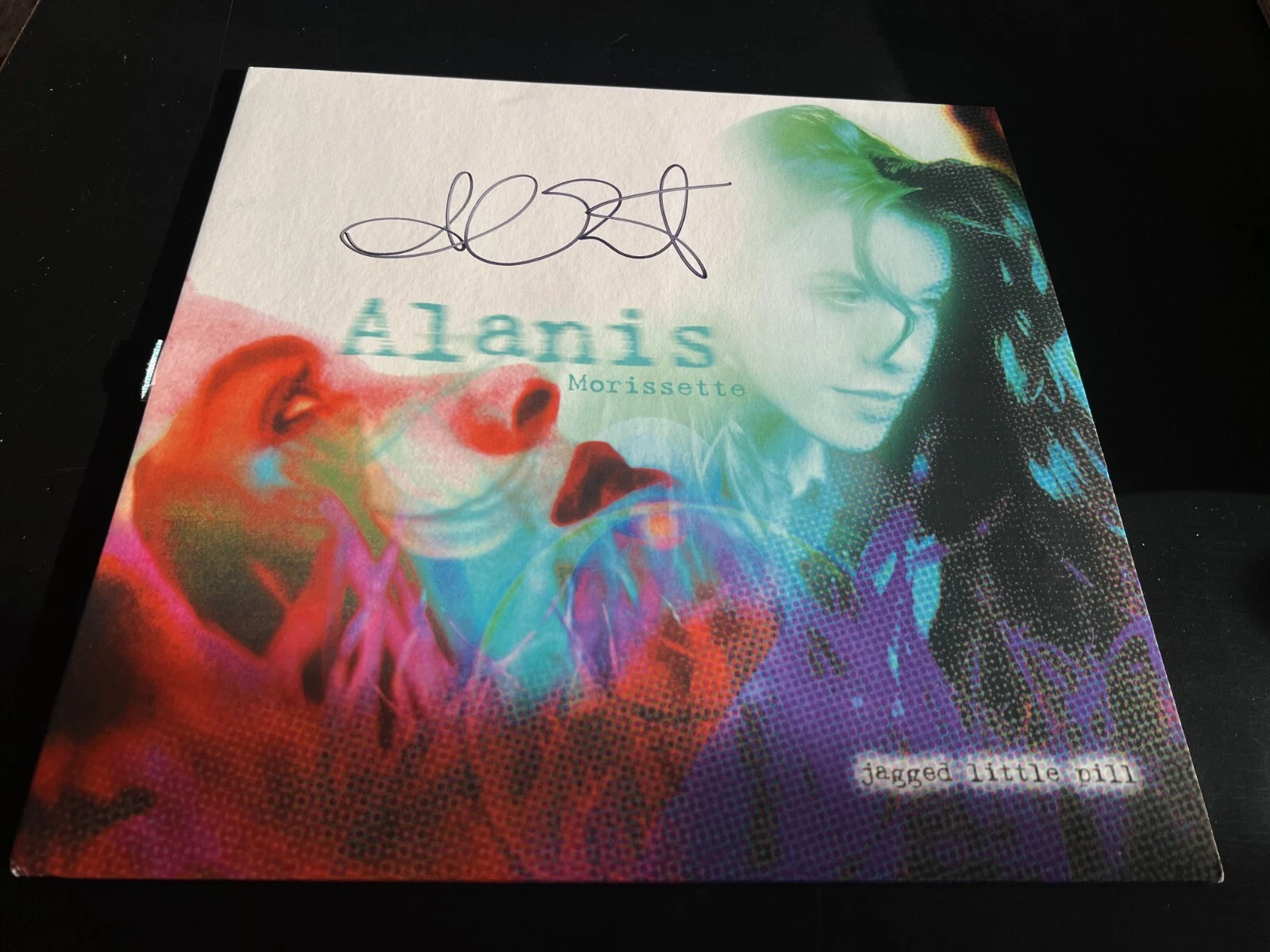 ALANIS MORISSETTE SIGNED AUTOGRAPH VINYL JAGGED LITTLE PILL IRONIC BECKETT BAS H