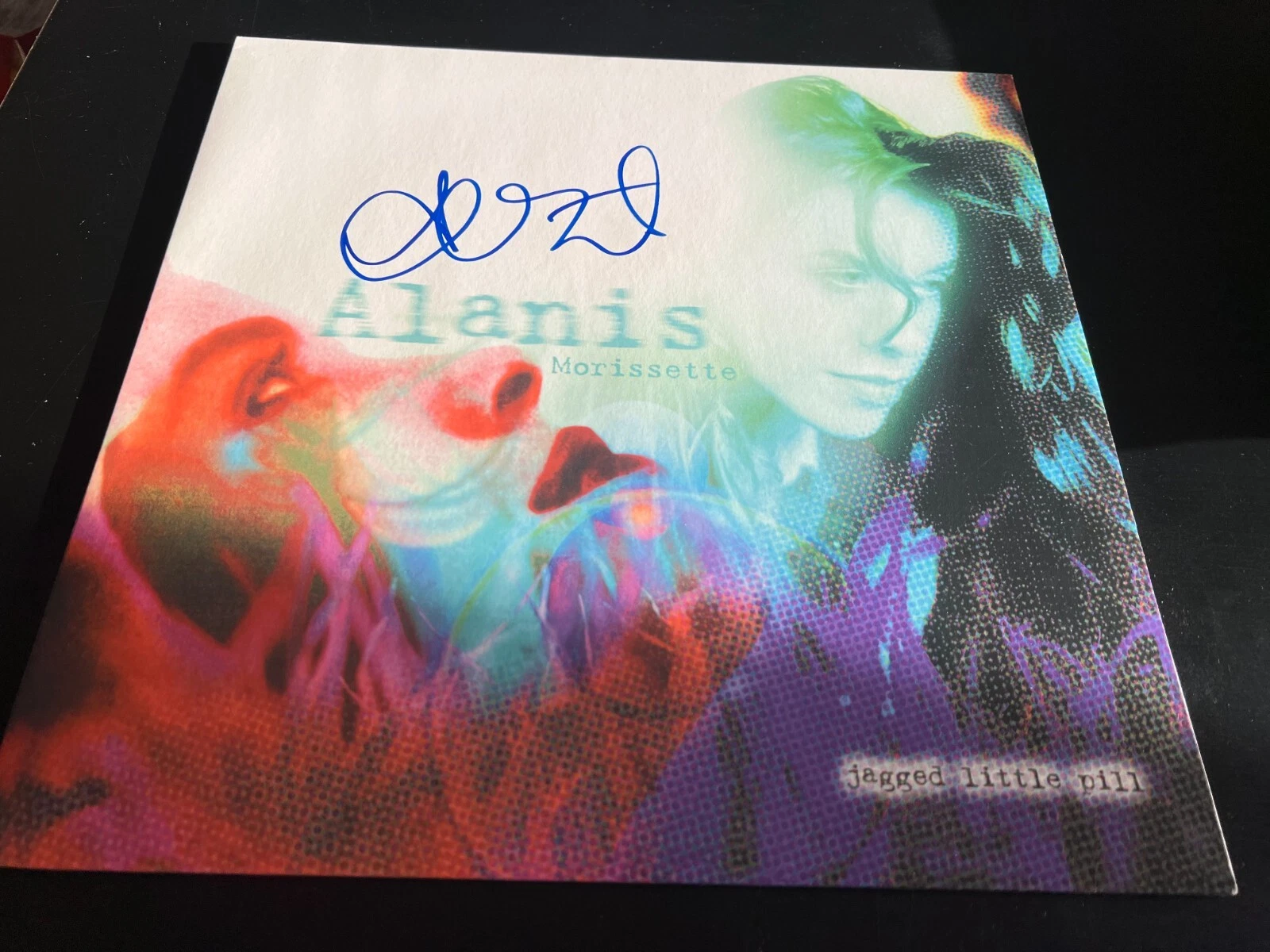 ALANIS MORISSETTE SIGNED AUTOGRAPH VINYL JAGGED LITTLE PILL IRONIC BECKETT BAS N