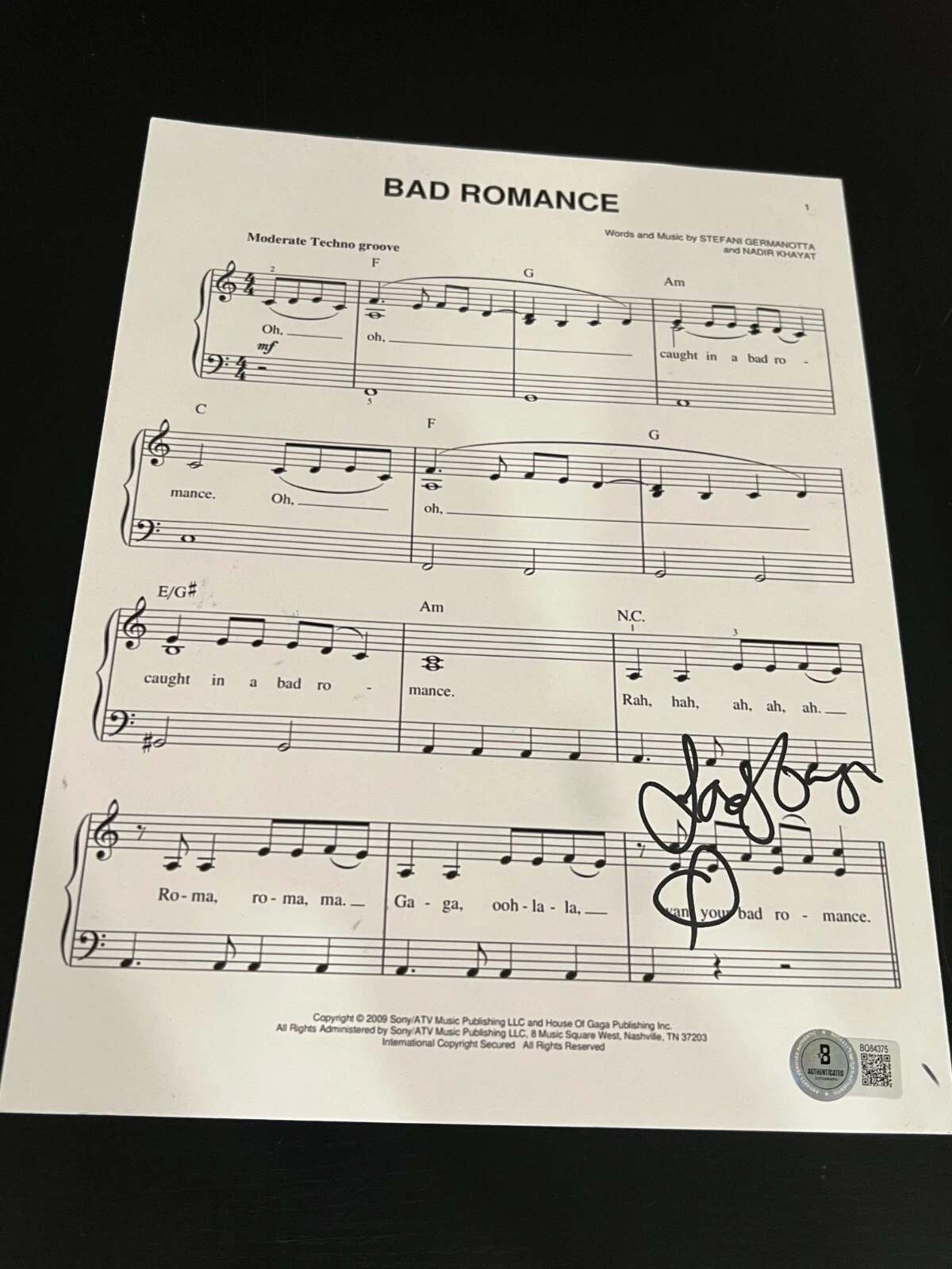 LADY GAGA SIGNED AUTOGRAPH SHEET MUSIC BAD ROMANCE THE FAME BECKETT BAS COA D