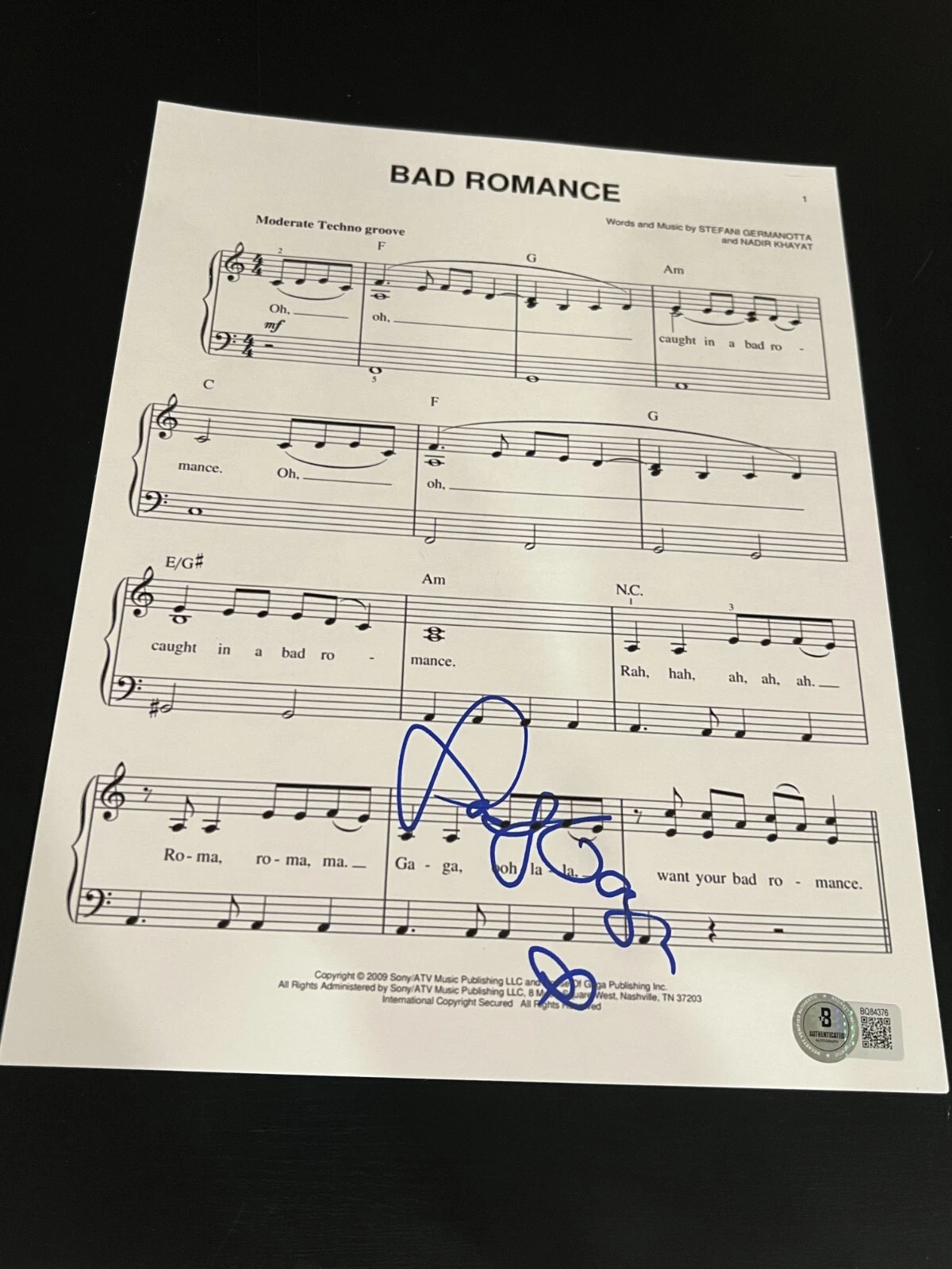 LADY GAGA SIGNED AUTOGRAPH SHEET MUSIC BAD ROMANCE THE FAME BECKETT BAS COA E