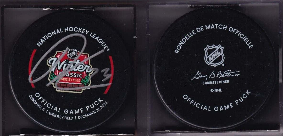 LUKAS REICHEL signed (CHICAGO BLACKHAWKS) 2024 WINTER CLASSIC official game puck