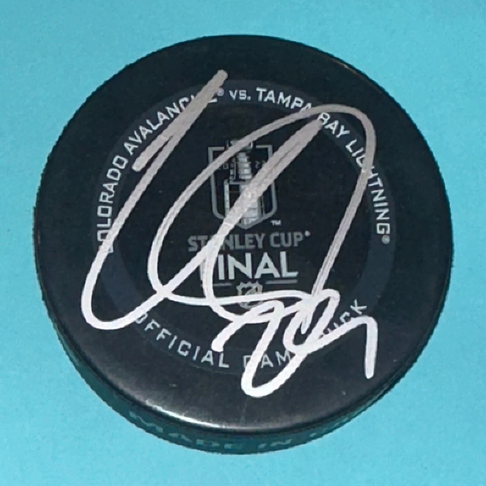 NATHAN MacKINNON Signed 2022 STANELY CUP Official GAME Puck Beckett Auth BAS