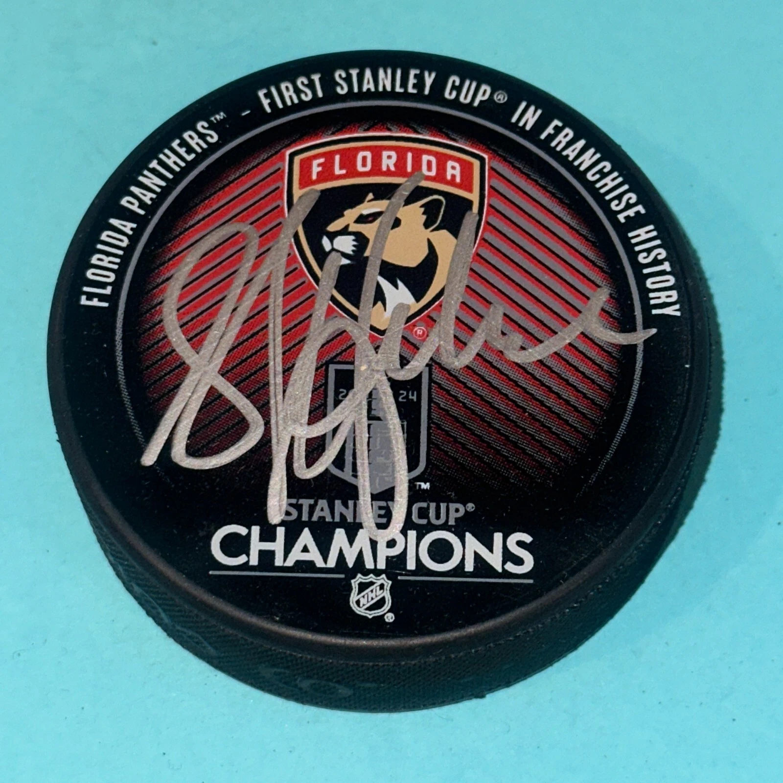SYLVAIN LEFEBVRE (Panthers) Signed 2024 STANLEY CUP CHAMPS Puck Beckett (BAS)