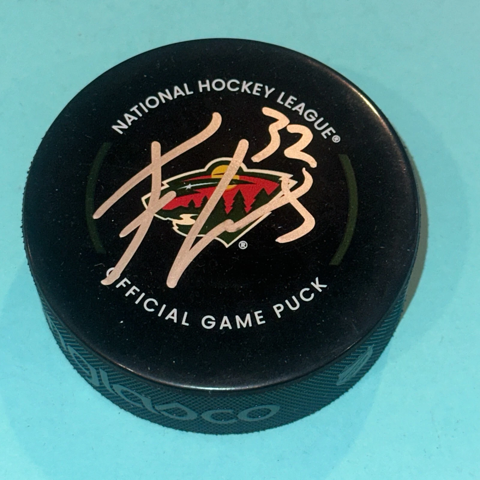 FILIP GUSTAVSSON Signed Minnesota WILD Official GAME Puck Beckett (BAS)
