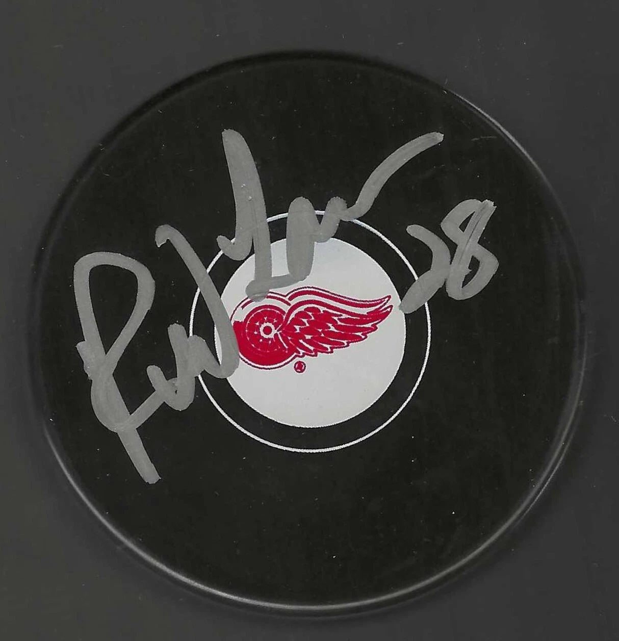 Reed Larson Signed Detroit Red Wings Puck