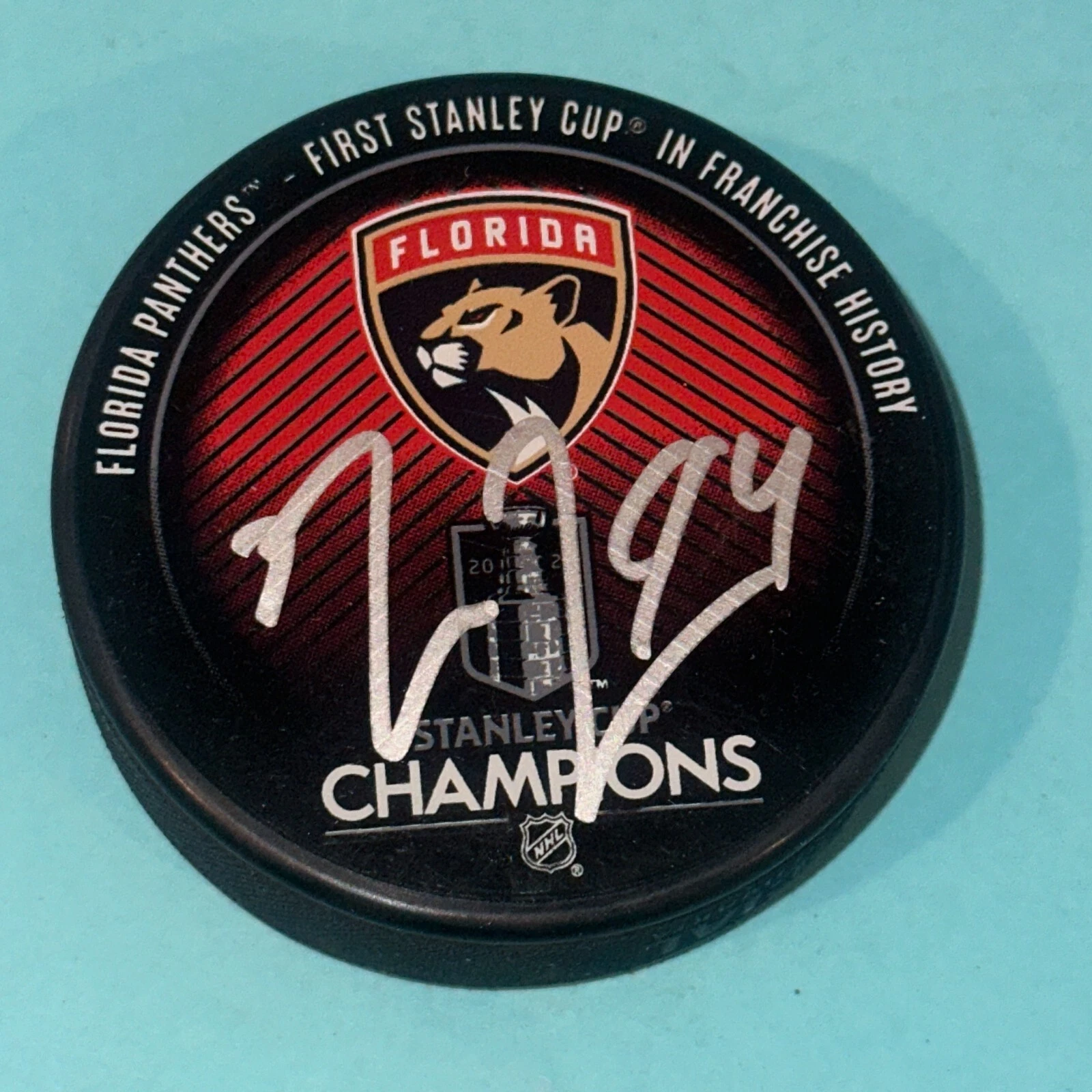 RYAN LOMBERG Signed PANTHERS 2024 STANLEY CUP CHAMPS Puck Beckett BAS