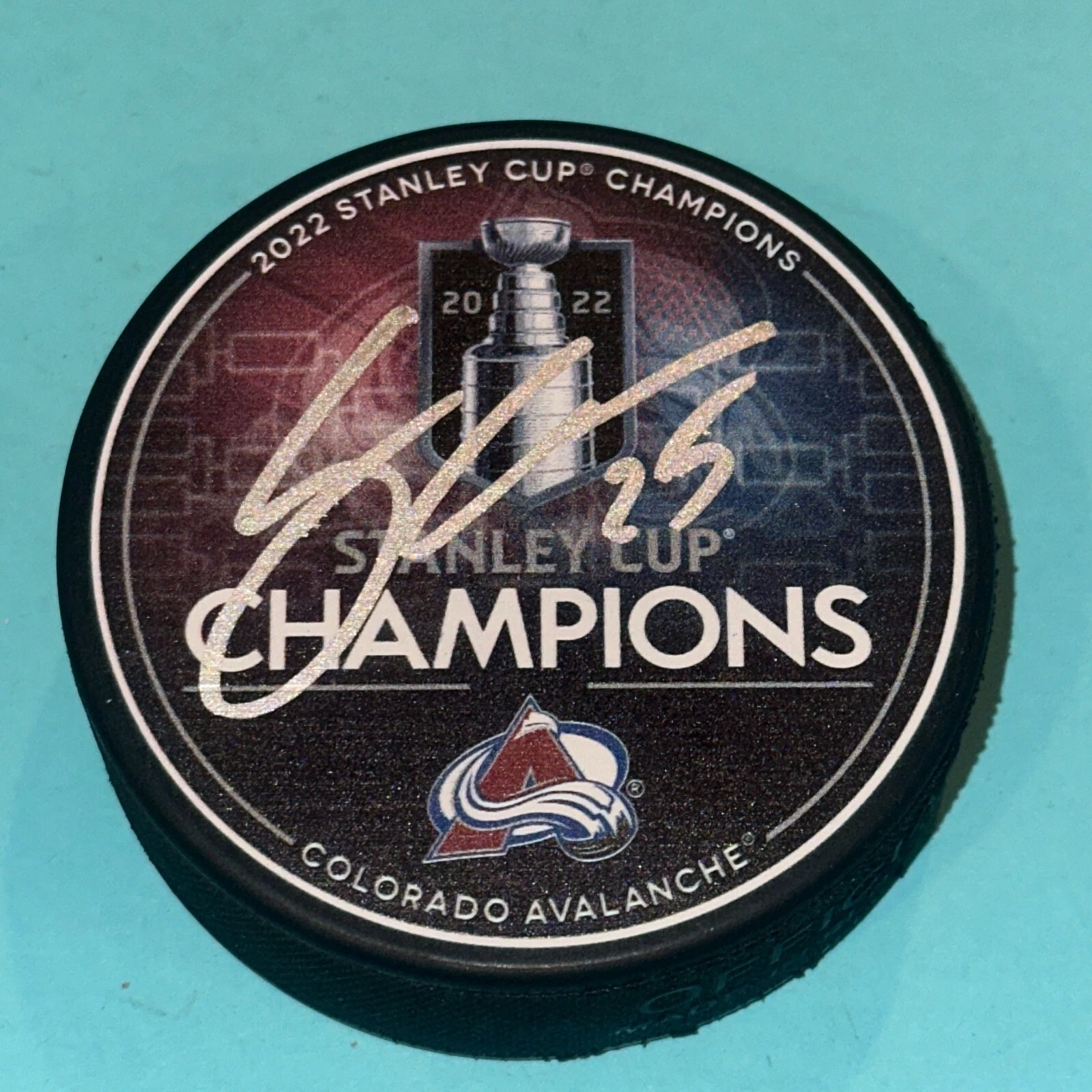 LOGAN O'CONNOR Signed AVALANCHE 2022 STANLEY CUP CHAMPS Puck Beckett (BAS)