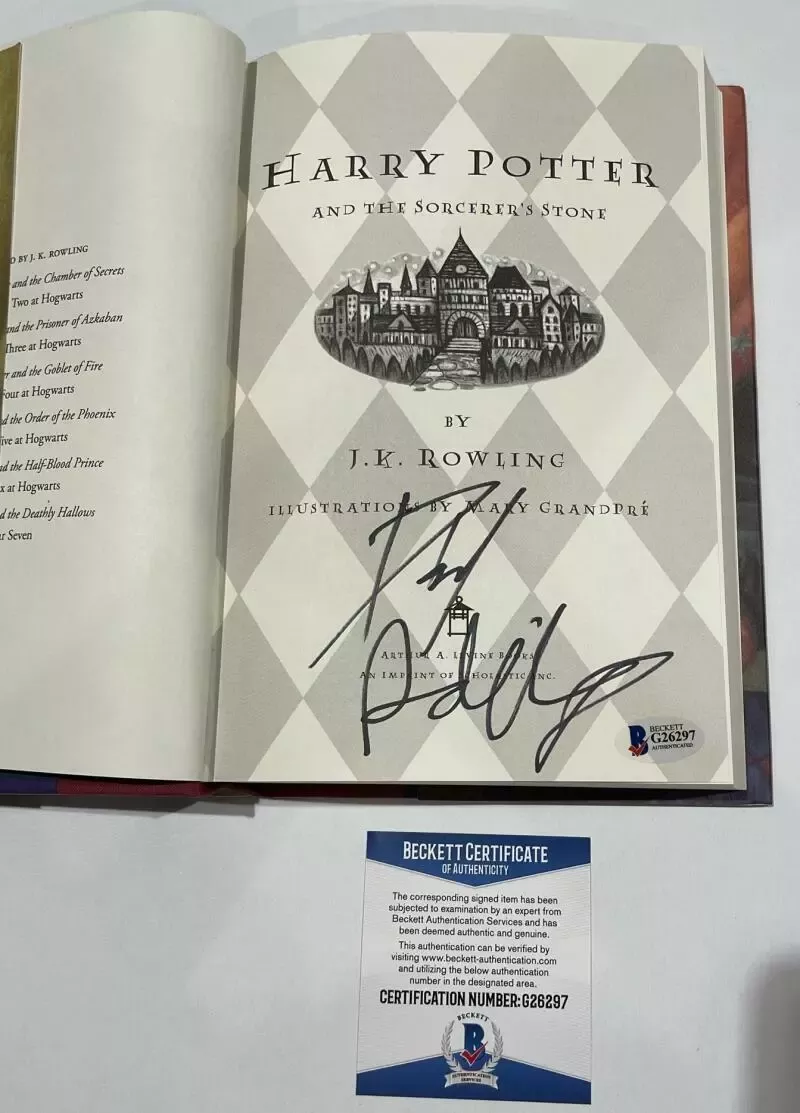 DANIEL RADCLIFFE SIGNED HARRY POTTER AND THE SORCERER'S STONE BOOK BECKETT 6