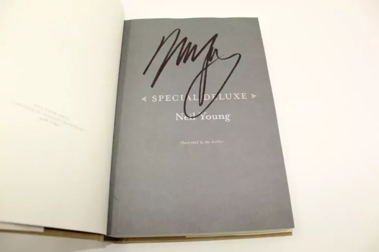 NEIL YOUNG SIGNED AUTOGRAPH “SPECIAL DELUXE” BOOK – CSNY, BUFFALO SPRINGFIELD  COLLECTIBLE MEMORABILIA