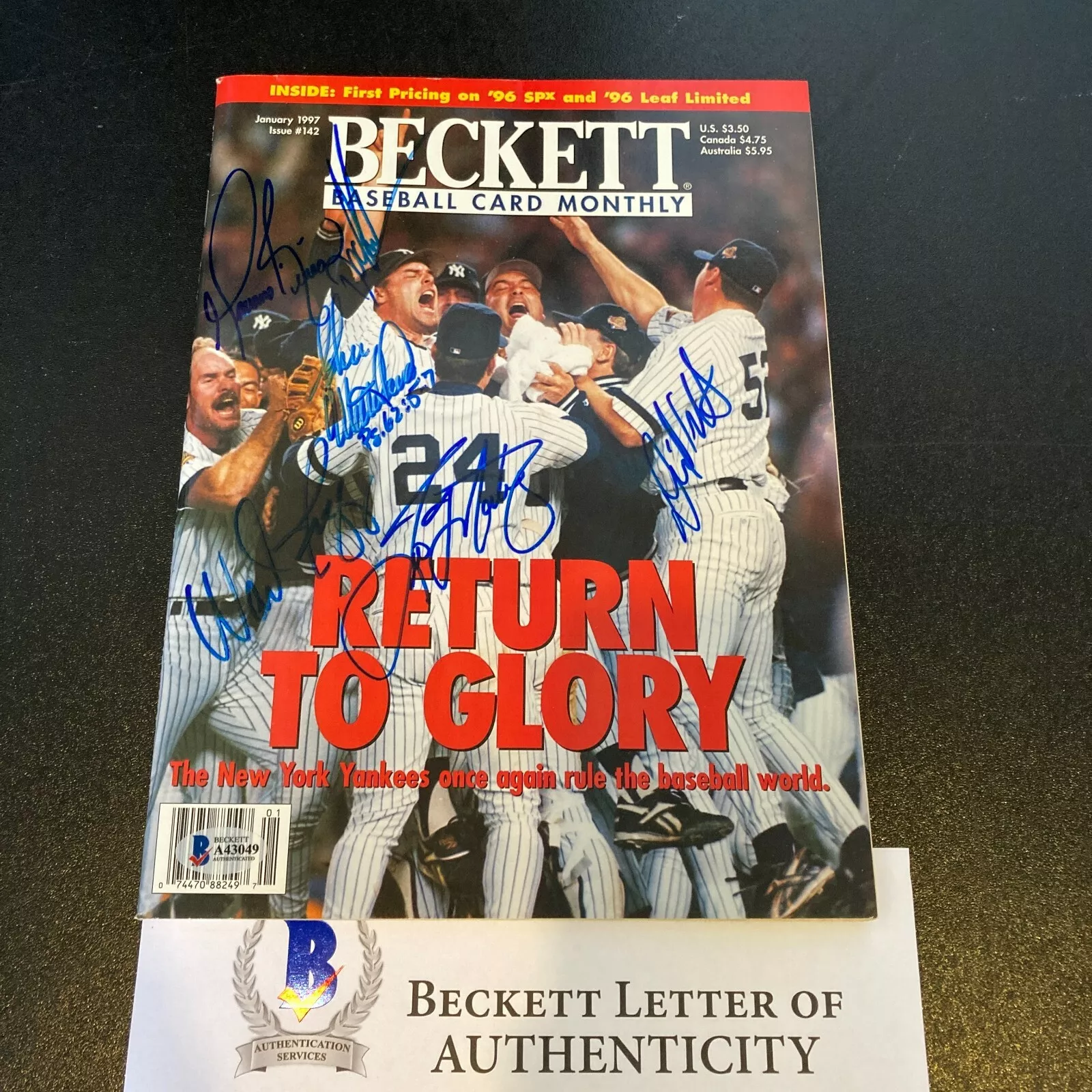 1996 NEW YORK YANKEES WORLD SERIES CHAMPS TEAM SIGNED MAGAZINE BECKETT COA COLLECTIBLE MEMORABILIA