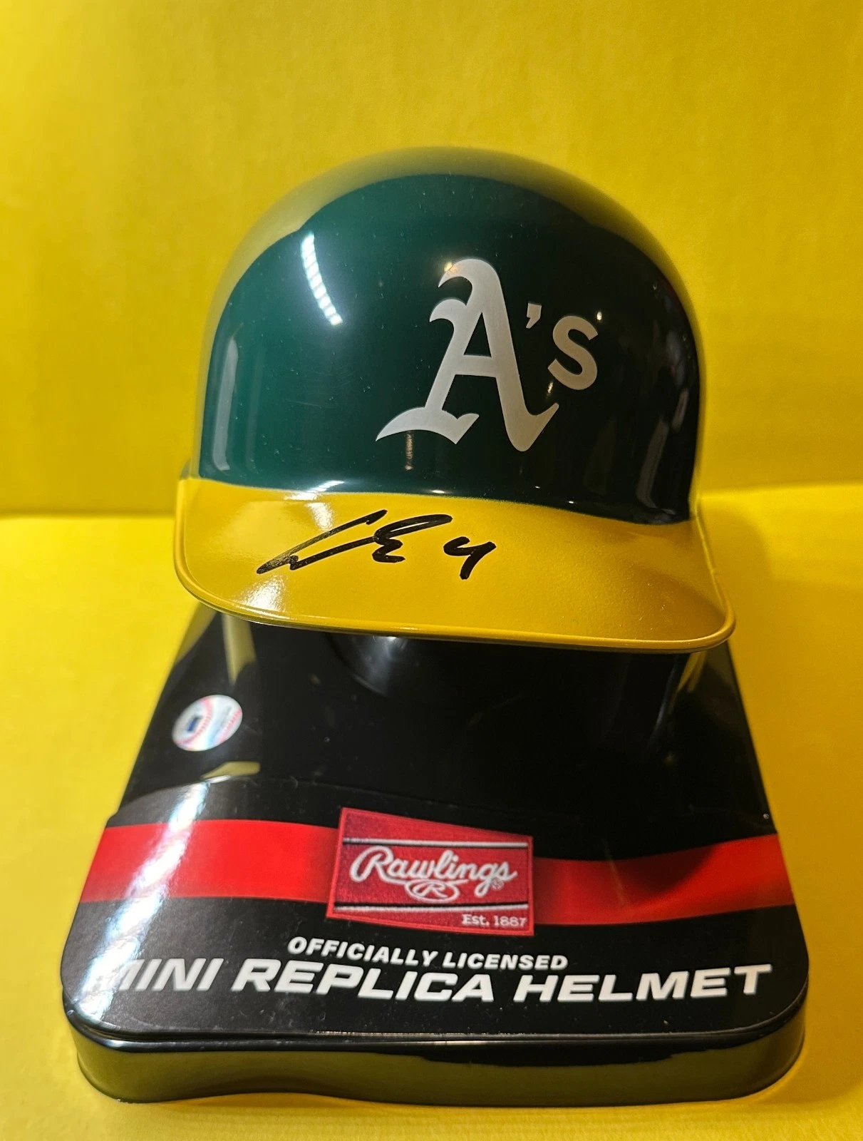 LAWRENCE BUTLER OAKLAND A'S SIGNED AUTOGRAPHED RAWLINGS MINI HELMET BECKETT
