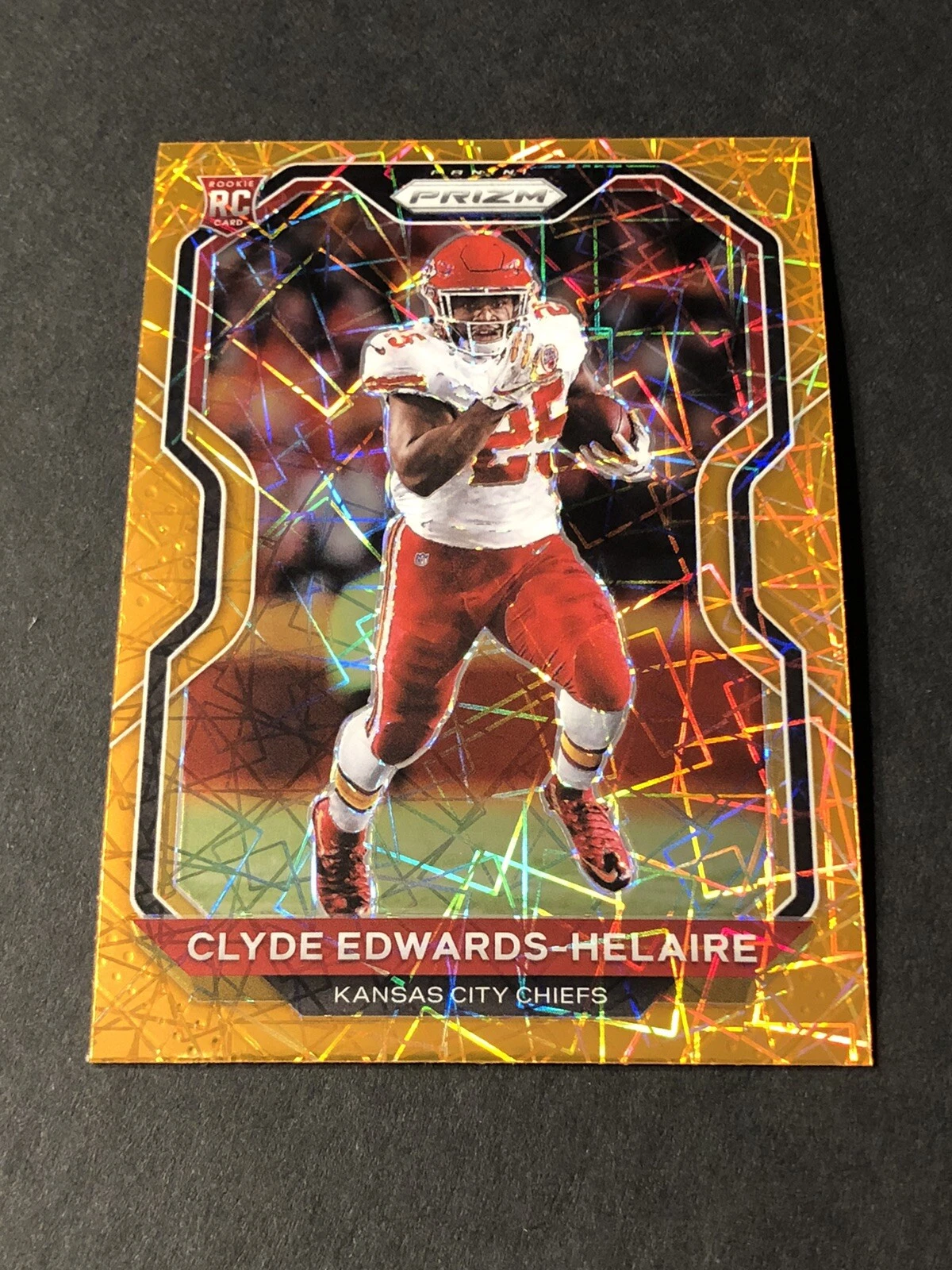 2020 NFL Panini Prizm Clyde Edwards-Helaire Orange Laser Rookie Prizm #328