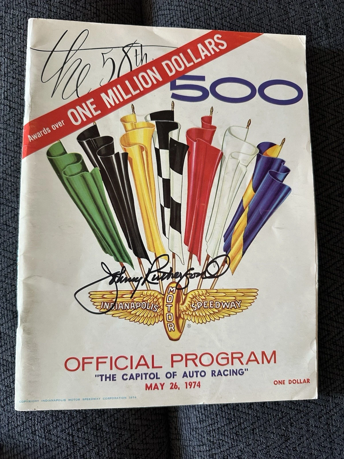 1974 INDY 500 PROGRAM SIGNED BY WINNER JOHNNY RUTHERFORD AUTOGRAPHED COLLECTIBLE MEMORABILIA