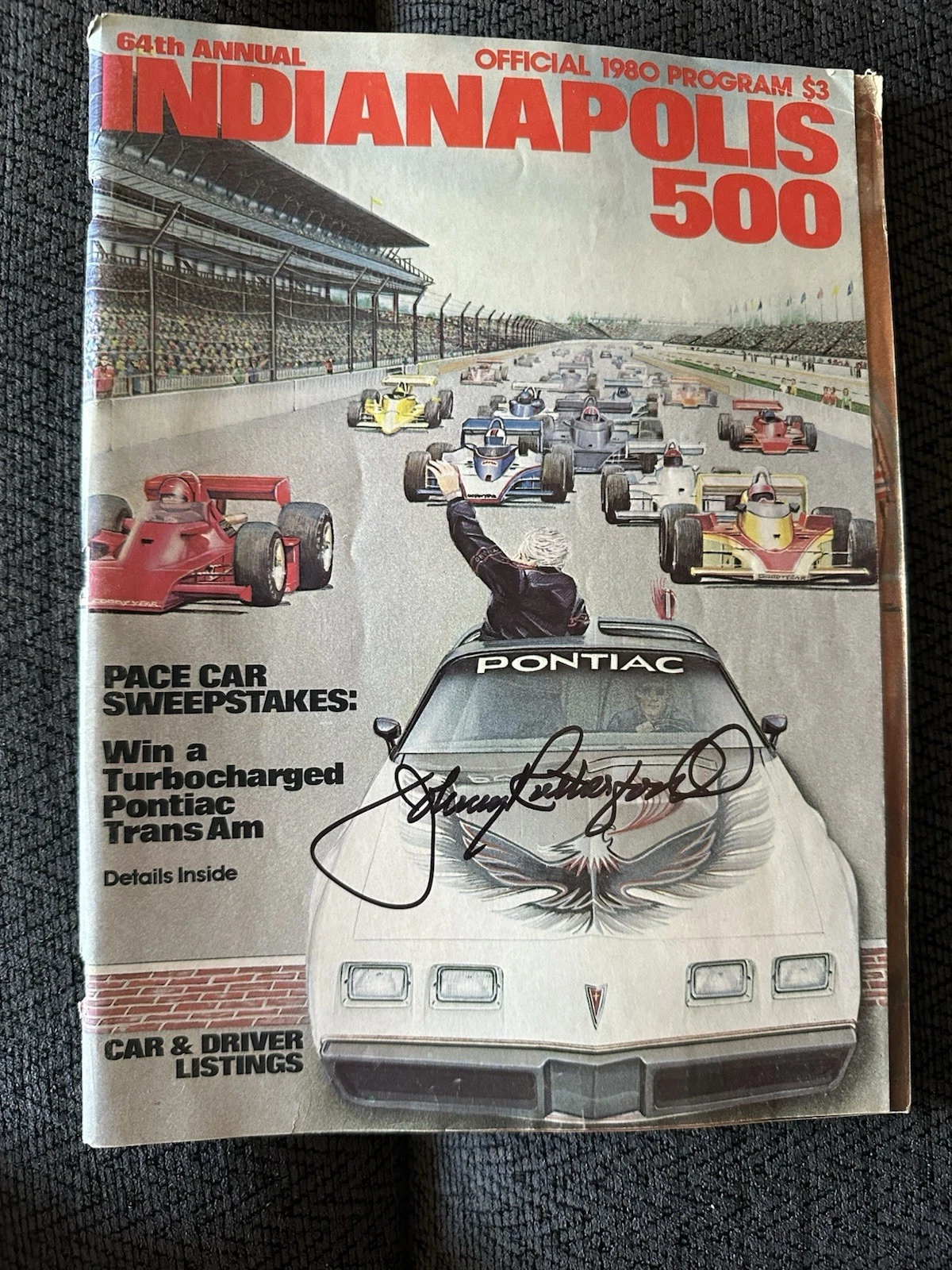1980 INDY 500 PROGRAM SIGNED BY WINNER JOHNNY RUTHERFORD AUTOGRAPHED COLLECTIBLE MEMORABILIA