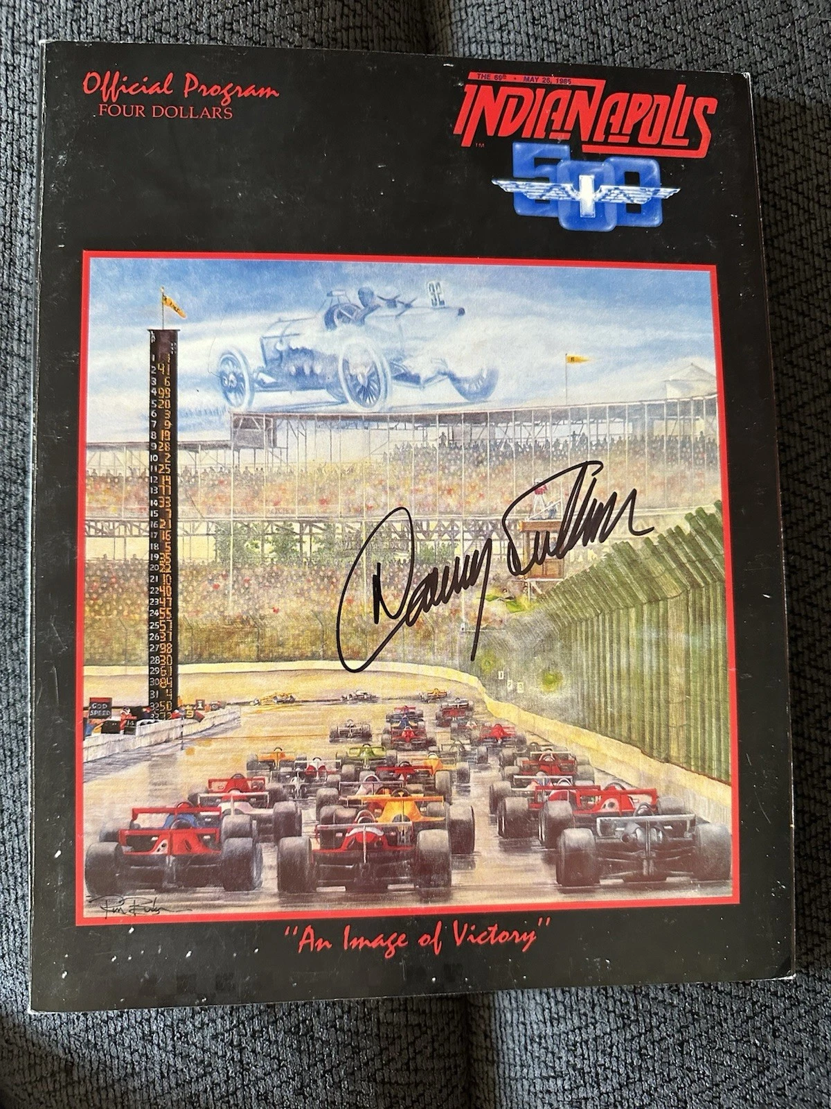 1985 INDY 500 PROGRAM SIGNED BY WINNER DANNY SULLIVAN AUTOGRAPHED COLLECTIBLE MEMORABILIA
