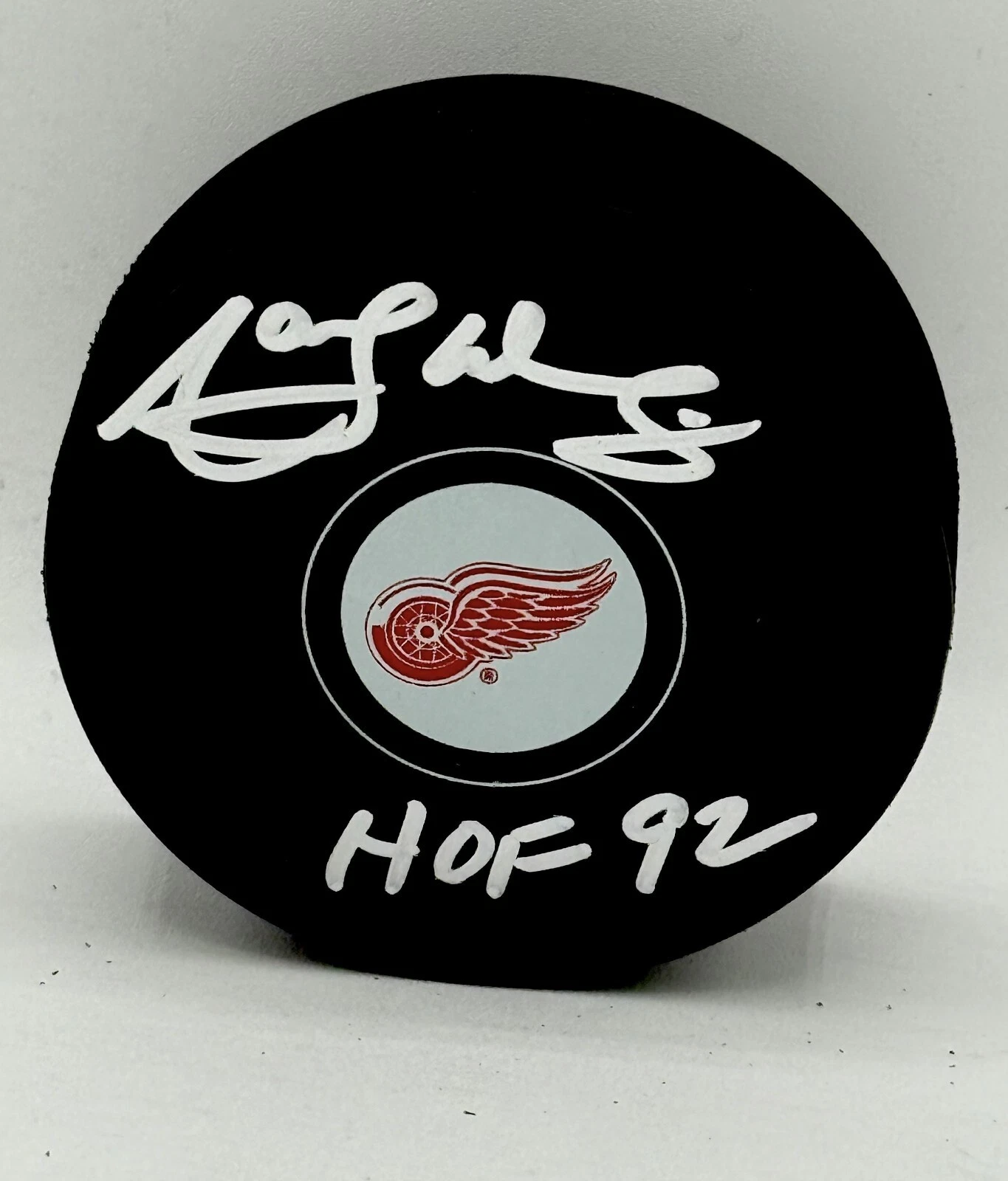 Marcel Dionne signed Detroit Red Wings Puck W/ HOF Inscription Beckett Witnessed